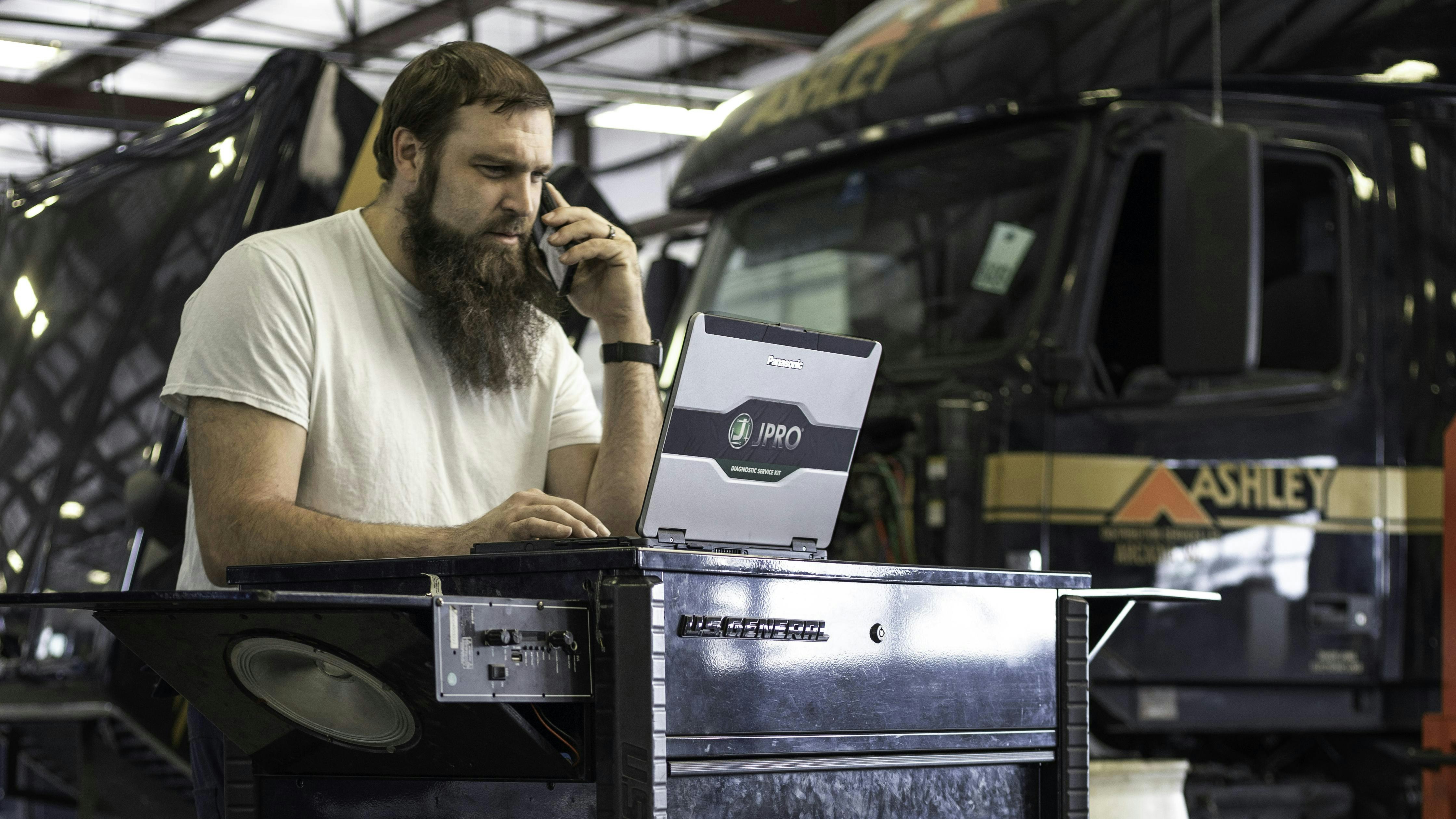 While tablets offer portability, many technicians prefer laptops for multitasking across multiple windows and for their added durability in shop environments.