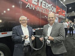 Al Anderson, VP of Sales and Marketing (L) and Dan Miller, sr. manager of Fleet Sales (R), of Peterson Mfg., show off the Repairable J560 connector at ATA’s Management Conference & Exhibition. Al Anderson, VP of Sales and Marketing (L) and Dan Miller, sr. manager of Fleet Sales (R), of Peterson Mfg., show off the Repairable J560 connector at ATA’s Management Conference & Exhibition.