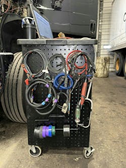 Missy Albin, technician at Taylor and Lloyd International, includes a pegboard in her setup where she hangs a 5V load tester, stethoscope, numerous breakouts, and electrical tape. Missy Albin, technician at Taylor and Lloyd International, includes a pegboard in her setup where she hangs a 5V load tester, stethoscope, numerous breakouts, and electrical tape.
