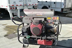 Transport Services uses a heated pressure washer to help break down grime and adhesive more effectively. Transport Services uses a heated pressure washer to help break down grime and adhesive more effectively.