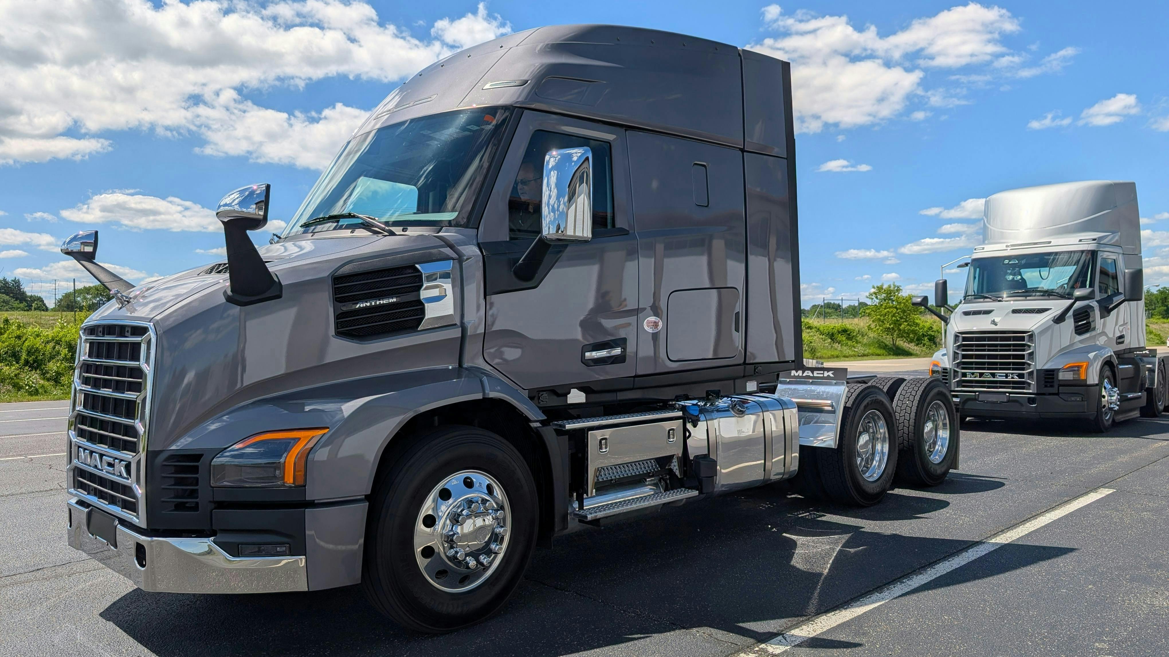 Shown: The dark grey redesigned Mack Anthem Day Cab on the Mack Experience Center test track. Its shorter 113.5-inch BBC enhances city maneuverability and provides a critical 12-foot forward visibility advantage.