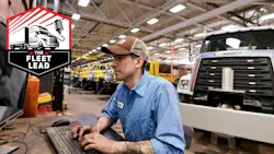 Mitchell 1 customer technician at computer